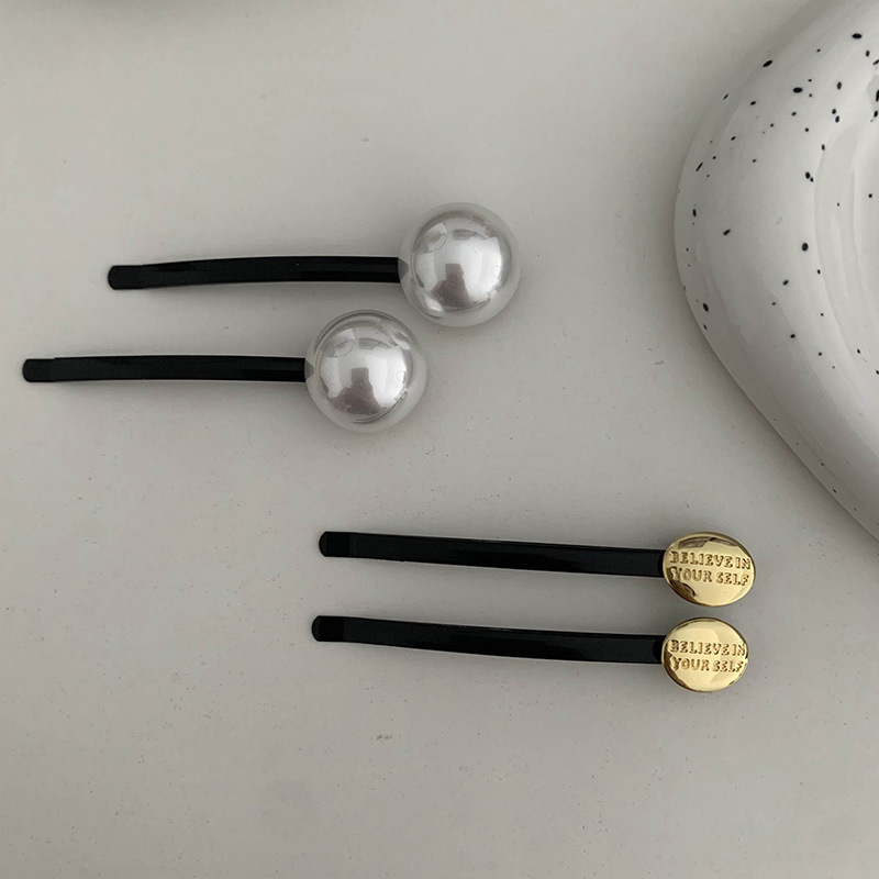 กิ๊บติดผมรูปหัวเข็มขัดสีทองมุก - Head Racket Boom บทวิจารณ์และราคา